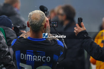 2024-04-22 - Federico Dimarco of FC Internazionale celebrates the victory of the Serie A 2023/24 title during Serie A 2023/24 football match between AC Milan and FC Internazionale at San Siro Stadium, Milan, Italy on April 22, 2024 - AC MILAN VS INTER - FC INTERNAZIONALE - ITALIAN SERIE A - SOCCER