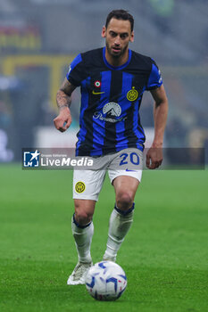 2024-04-22 - Hakan Calhanoglu of FC Internazionale seen in action during Serie A 2023/24 football match between AC Milan and FC Internazionale at San Siro Stadium, Milan, Italy on April 22, 2024 - AC MILAN VS INTER - FC INTERNAZIONALE - ITALIAN SERIE A - SOCCER