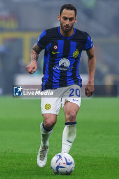 2024-04-22 - Hakan Calhanoglu of FC Internazionale seen in action during Serie A 2023/24 football match between AC Milan and FC Internazionale at San Siro Stadium, Milan, Italy on April 22, 2024 - AC MILAN VS INTER - FC INTERNAZIONALE - ITALIAN SERIE A - SOCCER