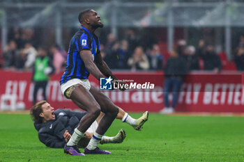 2024-04-22 - Marcus Thuram of FC Internazionale celebrates the club's 20th Scudetto during Serie A 2023/24 football match between AC Milan and FC Internazionale at San Siro Stadium, Milan, Italy on April 22, 2024 - AC MILAN VS INTER - FC INTERNAZIONALE - ITALIAN SERIE A - SOCCER