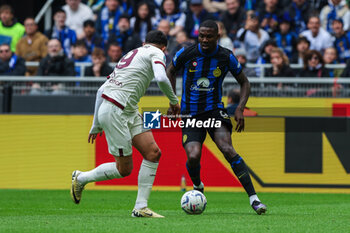 2024-04-28 - Marcus Thuram of FC Internazionale seen in action during Serie A 2023/24 football match between FC Internazionale and Torino FC at Giuseppe Meazza Stadium, Milan, Italy on April 28, 2024 - INTER - FC INTERNAZIONALE VS TORINO FC - ITALIAN SERIE A - SOCCER