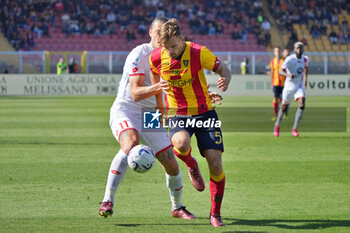 2024-04-27 - Marin Pongracic of US Lecce in action against Milan Djuric of AC Monza - US LECCE VS AC MONZA - ITALIAN SERIE A - SOCCER