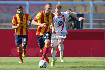 2024-04-27 - Alexis Blin of US Lecce and Geōrgios Kyriakopoulos of AC Monza - US LECCE VS AC MONZA - ITALIAN SERIE A - SOCCER