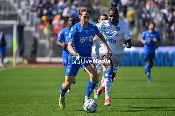 05/05/2024 - Empoli FC's midfielder Jacopo Fazzini against Frosinone Calcio's defender Caleb Okoli - EMPOLI FC VS FROSINONE CALCIO - SERIE A - CALCIO