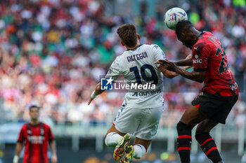 2024-05-05 - Mateo Retegui of Genoa CFC competes for the ball with Fikayo Tomori of AC Milan during Serie A 2023/24 football match between AC Milan and Genoa CFC at San Siro Stadium, Milan, Italy on May 05, 2024 - AC MILAN VS GENOA CFC - ITALIAN SERIE A - SOCCER