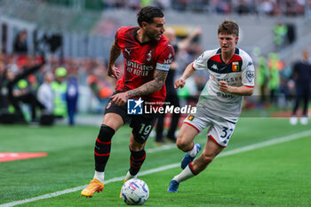 2024-05-05 - Theo Hernandez of AC Milan (L) seen in action during Serie A 2023/24 football match between AC Milan and Genoa CFC at San Siro Stadium, Milan, Italy on May 05, 2024 - AC MILAN VS GENOA CFC - ITALIAN SERIE A - SOCCER