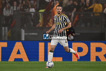 2024-05-05 - Federico Gatti of Juventus F.C. during the 35th day of the Serie A Championship between A.S. Roma vs Juventus F.C. at the Olympic Stadium Olympic on May 5, 2024 in Rome, Italy. - AS ROMA VS JUVENTUS FC - ITALIAN SERIE A - SOCCER