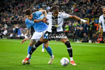 06/05/2024 - Udinese's Kingsley Ehizibue in action against Napoli's Mathias Olivera - UDINESE CALCIO VS SSC NAPOLI - SERIE A - CALCIO