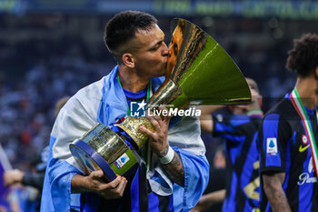 2024-05-19 - Lautaro Martinez of FC Internazionale poses with the Scudetto trophy during Serie A 2023/24 football match between FC Internazionale and SS Lazio at Giuseppe Meazza Stadium, Milan, Italy on May 19, 2024 - INTER - FC INTERNAZIONALE VS SS LAZIO - ITALIAN SERIE A - SOCCER