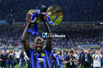 2024-05-19 - Marcus Thuram of FC Internazionale celebrates with the Scudetto trophy during Serie A 2023/24 football match between FC Internazionale and SS Lazio at Giuseppe Meazza Stadium, Milan, Italy on May 19, 2024 - INTER - FC INTERNAZIONALE VS SS LAZIO - ITALIAN SERIE A - SOCCER