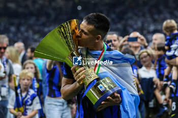 2024-05-19 - Lautaro Martinez of FC Internazionale celebrates with the Scudetto trophy during Serie A 2023/24 football match between FC Internazionale and SS Lazio at Giuseppe Meazza Stadium, Milan, Italy on May 19, 2024 - INTER - FC INTERNAZIONALE VS SS LAZIO - ITALIAN SERIE A - SOCCER