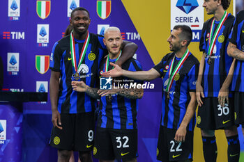 2024-05-19 - Marcus Thuram of FC Internazionale,Federico Dimarco of FC Internazionale and Henrikh Mkhitaryan of FC Internazionale seen at the trophy ceremony during Serie A 2023/24 football match between FC Internazionale and SS Lazio at Giuseppe Meazza Stadium, Milan, Italy on May 19, 2024 - INTER - FC INTERNAZIONALE VS SS LAZIO - ITALIAN SERIE A - SOCCER