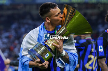 2024-05-19 - Lautaro Martinez of FC Internazionale poses with the trophy as FC Internazionale celebrates it's 20th league title following the Serie A 2023/24 football match between FC Internazionale and SS Lazio at Giuseppe Meazza Stadium, Milan, Italy on May 19, 2024 - INTER - FC INTERNAZIONALE VS SS LAZIO - ITALIAN SERIE A - SOCCER