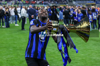 2024-05-19 - Marcus Thuram of FC Internazionale celebrates with the trophy as FC Internazionale celebrates it's 20th league title following the Serie A 2023/24 football match between FC Internazionale and SS Lazio at Giuseppe Meazza Stadium, Milan, Italy on May 19, 2024 - INTER - FC INTERNAZIONALE VS SS LAZIO - ITALIAN SERIE A - SOCCER