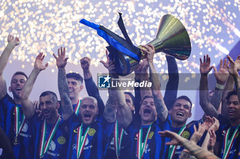 2024-05-19 - Nicolo Barella of FC Internazionale lifts the trophy as FC Internazionale celebrates it's 20th league title following the Serie A 2023/24 football match between FC Internazionale and SS Lazio at Giuseppe Meazza Stadium, Milan, Italy on May 19, 2024 - INTER - FC INTERNAZIONALE VS SS LAZIO - ITALIAN SERIE A - SOCCER