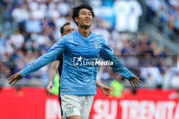 2024-05-19 - Daichi Kamada of SS Lazio celebrates after scoring a goal during Serie A 2023/24 football match between FC Internazionale and SS Lazio at Giuseppe Meazza Stadium, Milan, Italy on May 19, 2024 - INTER - FC INTERNAZIONALE VS SS LAZIO - ITALIAN SERIE A - SOCCER