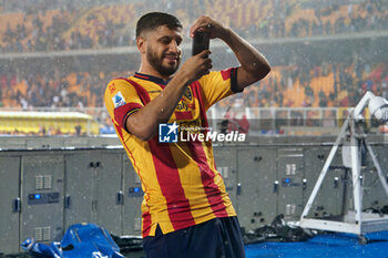 2024-05-18 - Hamza Rafia of US Lecce photographs his fans - US LECCE VS ATALANTA BC - ITALIAN SERIE A - SOCCER