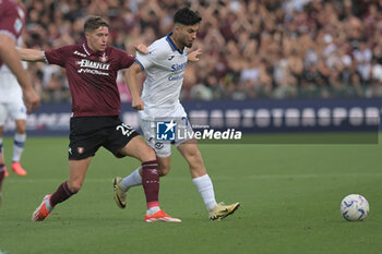 2024-05-20 - Toma Basic of US Salernitana 1919 competes for the ball with Suat Serdar of Hellas Verona FC during the Serie A Match between US Salernitana 1919 vs Hellas Verona FC at Arechi Stadium - US SALERNITANA VS HELLAS VERONA FC - ITALIAN SERIE A - SOCCER