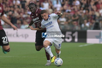 2024-05-20 - Tomas Suslov of Hellas Verona FC competes for the ball with Lassana Coulibaly of US Salernitana 1919 during the Serie A Match between US Salernitana 1919 vs Hellas Verona FC at Arechi Stadium - US SALERNITANA VS HELLAS VERONA FC - ITALIAN SERIE A - SOCCER