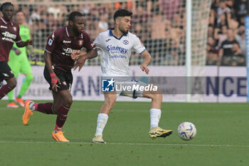 2024-05-20 - Lassana Coulibaly of US Salernitana 1919 competes for the ball with Suat Serdar of Hellas Verona FC during the Serie A Match between US Salernitana 1919 vs Hellas Verona FC at Arechi Stadium - US SALERNITANA VS HELLAS VERONA FC - ITALIAN SERIE A - SOCCER