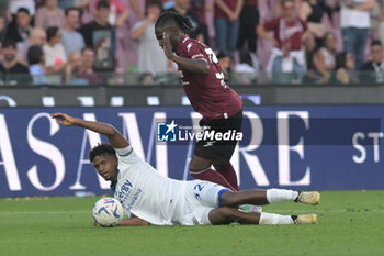 2024-05-20 - Juan Cabal of Hellas Verona FC competes for the ball with Loum Tchaouna of US Salernitana 1919 during the Serie A Match between US Salernitana 1919 vs Hellas Verona FC at Arechi Stadium - US SALERNITANA VS HELLAS VERONA FC - ITALIAN SERIE A - SOCCER