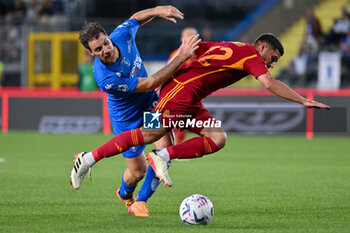 2024-05-26 - AS Roma's midfielder Houssem Aouar against Empoli FC's midfielder Simone Bastoni - EMPOLI FC VS AS ROMA - ITALIAN SERIE A - SOCCER