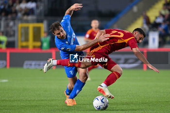 2024-05-26 - AS Roma's midfielder Houssem Aouar against Empoli FC's midfielder Simone Bastoni - EMPOLI FC VS AS ROMA - ITALIAN SERIE A - SOCCER