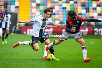 2024-02-18 - Udinese's Florian Thauvin in action against Cagliari's Tommaso Augello - UDINESE CALCIO VS CAGLIARI CALCIO - ITALIAN SERIE A - SOCCER
