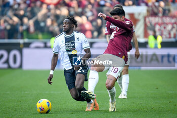 2024-03-16 - Udinese's Hassane Kamara hindered by Torino's Raoul Bellanova - UDINESE CALCIO VS TORINO FC - ITALIAN SERIE A - SOCCER