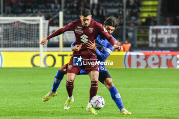 2024-04-06 - Antonio Sanabria (Torino) hampered by Sebastiano Luperto (Empoli) - EMPOLI FC VS TORINO FC - ITALIAN SERIE A - SOCCER