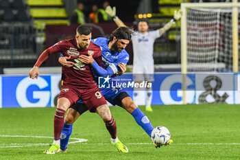 2024-04-06 - Antonio Sanabria (Torino) thwarted by Sebastiano Luperto (Empoli) - EMPOLI FC VS TORINO FC - ITALIAN SERIE A - SOCCER