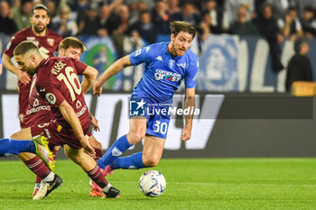 2024-04-06 - Simone Bastoni (Empoli) is fouled by Nikola Vlasic (Torino) - EMPOLI FC VS TORINO FC - ITALIAN SERIE A - SOCCER
