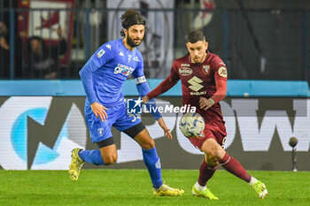 2024-04-06 - Antonio Sanabria (Torino) fights for the ball against Sebastiano Luperto (Empoli) - EMPOLI FC VS TORINO FC - ITALIAN SERIE A - SOCCER