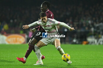 2024-01-07 - Dusan Vlahovic of Juventus FC competes for the ball with Loum Tchaouna of US Salernitana 1919 during Serie A between US Salernitana 1919 vs Juventus FC at Arechi Stadium - US SALERNITANA VS JUVENTUS FC - ITALIAN SERIE A - SOCCER