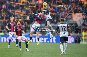 2024-02-11 - Pontus Almqvist (US Lecce) and Alexis Saelemaekers (Bologna Fc) in action - BOLOGNA FC VS US LECCE - ITALIAN SERIE A - SOCCER
