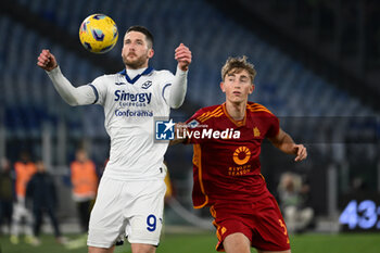 2024-01-20 - Thomas Henry of Hellas Verona F.C. and Dean Huijsen of A.S. Roma during the 21th day of the Serie A Championship between A.S. Roma vs Hellas Verona F.C., 20 January, 2024 at the Olympic Stadium in Rome, Italy. - AS ROMA VS HELLAS VERONA FC - ITALIAN SERIE A - SOCCER