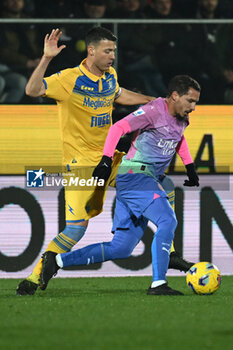 2024-02-03 - Luca Mazzitelli of Frosinone Calcio and Ismael Bennacer of A.C. Milan during the 23th day of the Serie A Championship between Frosinone Calcio vs A.C. Milan, 3 February 2024 at the Benito Stirpe Stadium, Frosinone, Italy. - FROSINONE CALCIO VS AC MILAN - ITALIAN SERIE A - SOCCER
