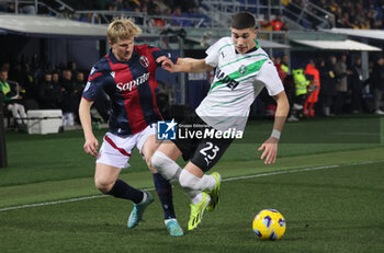 2024-02-03 - Cristian Volpato (u.s. Sassuolo) competes for the ball with Victor Kristiansen (Bologna f.c.) during the Italian Serie A TIM championship match Bologna f.c. Vs u.s. Sassuolo at Dal’Ara Stadium. Bologna, Italy, February 03, 2024. photo: corrispondente Bologna - BOLOGNA FC VS US SASSUOLO - ITALIAN SERIE A - SOCCER