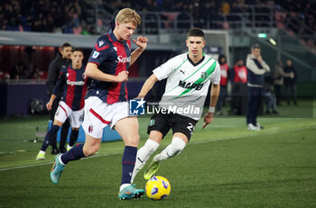 2024-02-03 - Cristian Volpato (u.s. Sassuolo) competes for the ball with Victor Kristiansen (Bologna f.c.) during the Italian Serie A TIM championship match Bologna f.c. Vs u.s. Sassuolo at Dal’Ara Stadium. Bologna, Italy, February 03, 2024. photo: corrispondente Bologna - BOLOGNA FC VS US SASSUOLO - ITALIAN SERIE A - SOCCER