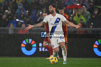 2024-02-10 - Hakan Calhanoglu of F.C. Inter during the 24th day of the Serie A Championship between A.S. Roma vs F.C. Inter, 10 February, 2024 at the Olympic Stadium in Rome, Italy. - AS ROMA VS INTER - FC INTERNAZIONALE - ITALIAN SERIE A - SOCCER