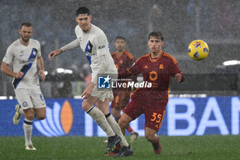 2024-02-10 - Alessandro Bastoni of F.C. Inter and Tommaso Baldanzi of A.S. Roma during the 24th day of the Serie A Championship between A.S. Roma vs F.C. Inter, 10 February, 2024 at the Olympic Stadium in Rome, Italy. - AS ROMA VS INTER - FC INTERNAZIONALE - ITALIAN SERIE A - SOCCER