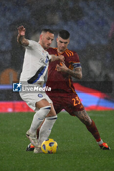2024-02-10 - Marko Arnautovic of F.C. Inter and Gianluca Mancini of A.S. Roma during the 24th day of the Serie A Championship between A.S. Roma vs F.C. Inter, 10 February, 2024 at the Olympic Stadium in Rome, Italy. - AS ROMA VS INTER - FC INTERNAZIONALE - ITALIAN SERIE A - SOCCER