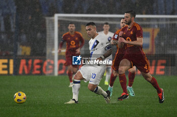 2024-02-10 - Lautaro Martinez of F.C. Inter and Bryan Cristante of A.S. Roma during the 24th day of the Serie A Championship between A.S. Roma vs F.C. Inter, 10 February, 2024 at the Olympic Stadium in Rome, Italy. - AS ROMA VS INTER - FC INTERNAZIONALE - ITALIAN SERIE A - SOCCER