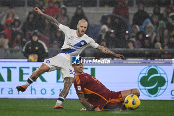 2024-02-10 - Federico Dimarco of F.C. Inter and Gianluca Mancini of A.S. Roma during the 24th day of the Serie A Championship between A.S. Roma vs F.C. Inter, 10 February, 2024 at the Olympic Stadium in Rome, Italy. - AS ROMA VS INTER - FC INTERNAZIONALE - ITALIAN SERIE A - SOCCER