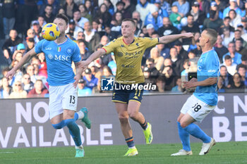 2024-02-17 - Amir Rrahmano of SSC Napoli competes for the ball with Albert Guomundsson during Serie A Match between SSC Napoli vs Genoa CFC at Diego Armando Maradona Stadium - SSC NAPOLI VS GENOA CFC - ITALIAN SERIE A - SOCCER