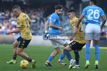 2024-02-17 - Khvicha Kvaratskhelia of SSC Napoli competes for the ball with Albert Guomundsson during Serie A Match between SSC Napoli vs Genoa CFC at Diego Armando Maradona Stadium - SSC NAPOLI VS GENOA CFC - ITALIAN SERIE A - SOCCER
