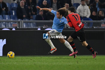 2024-03-01 - Matteo Guendouzi of S.S. Lazio and Christian Pulisic of A.C. Milan during the 27th day of the Serie A Championship between S.S. Lazio vs A.C. Milan, 1 March 2024 at the Olympic Stadium in Rome. - SS LAZIO VS AC MILAN - ITALIAN SERIE A - SOCCER