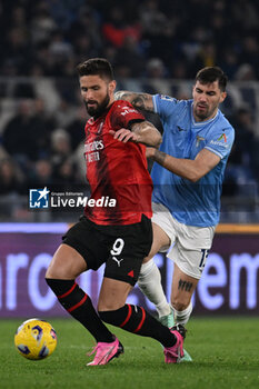 2024-03-01 - Olivier Giroud of A.C. Milan and Alessio Romagnoli of S.S. Lazio during the 27th day of the Serie A Championship between S.S. Lazio vs A.C. Milan, 1 March 2024 at the Olympic Stadium in Rome. - SS LAZIO VS AC MILAN - ITALIAN SERIE A - SOCCER