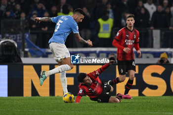 01/03/2024 - Matias Vecino of S.S. Lazio and Christian Pulisic of A.C. Milan during the 27th day of the Serie A Championship between S.S. Lazio vs A.C. Milan, 1 March 2024 at the Olympic Stadium in Rome. - SS LAZIO VS AC MILAN - SERIE A - CALCIO