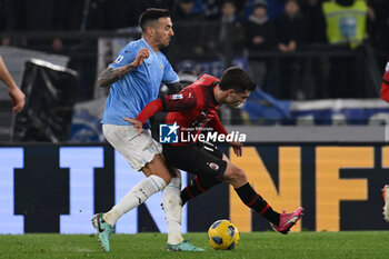 01/03/2024 - Matias Vecino of S.S. Lazio and Christian Pulisic of A.C. Milan during the 27th day of the Serie A Championship between S.S. Lazio vs A.C. Milan, 1 March 2024 at the Olympic Stadium in Rome. - SS LAZIO VS AC MILAN - SERIE A - CALCIO
